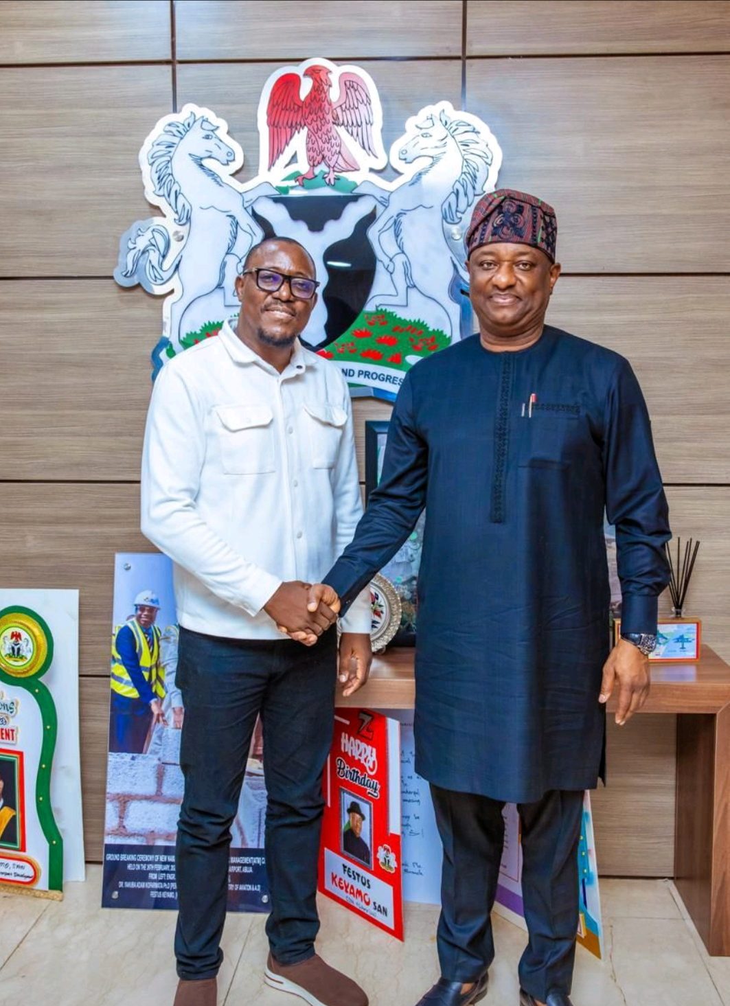 Handshake with the Hon. Minister of Aviation